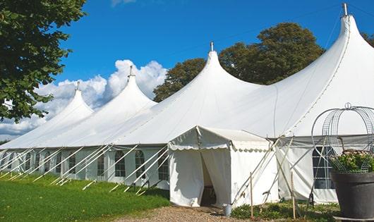 a line of sleek and modern portable restrooms ready for use at an upscale corporate event in Cool CA